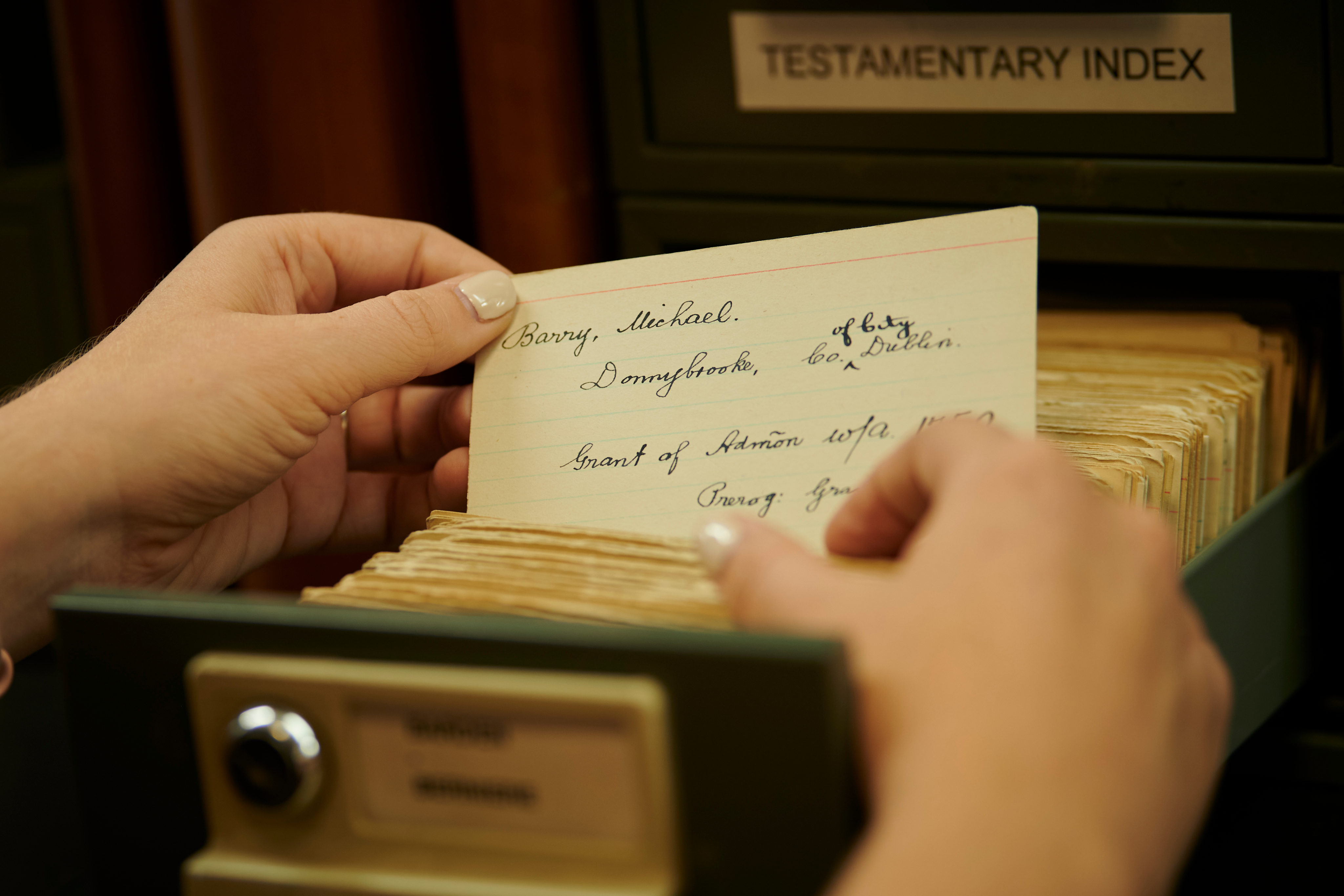 Person reading index card