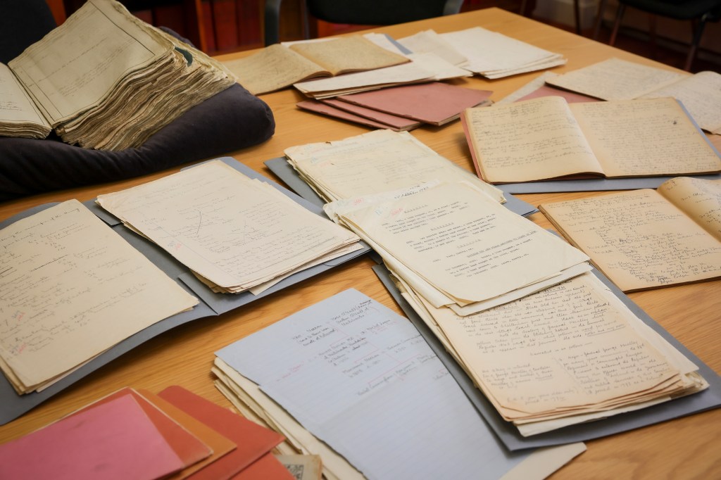 Collection of archival documents on a table